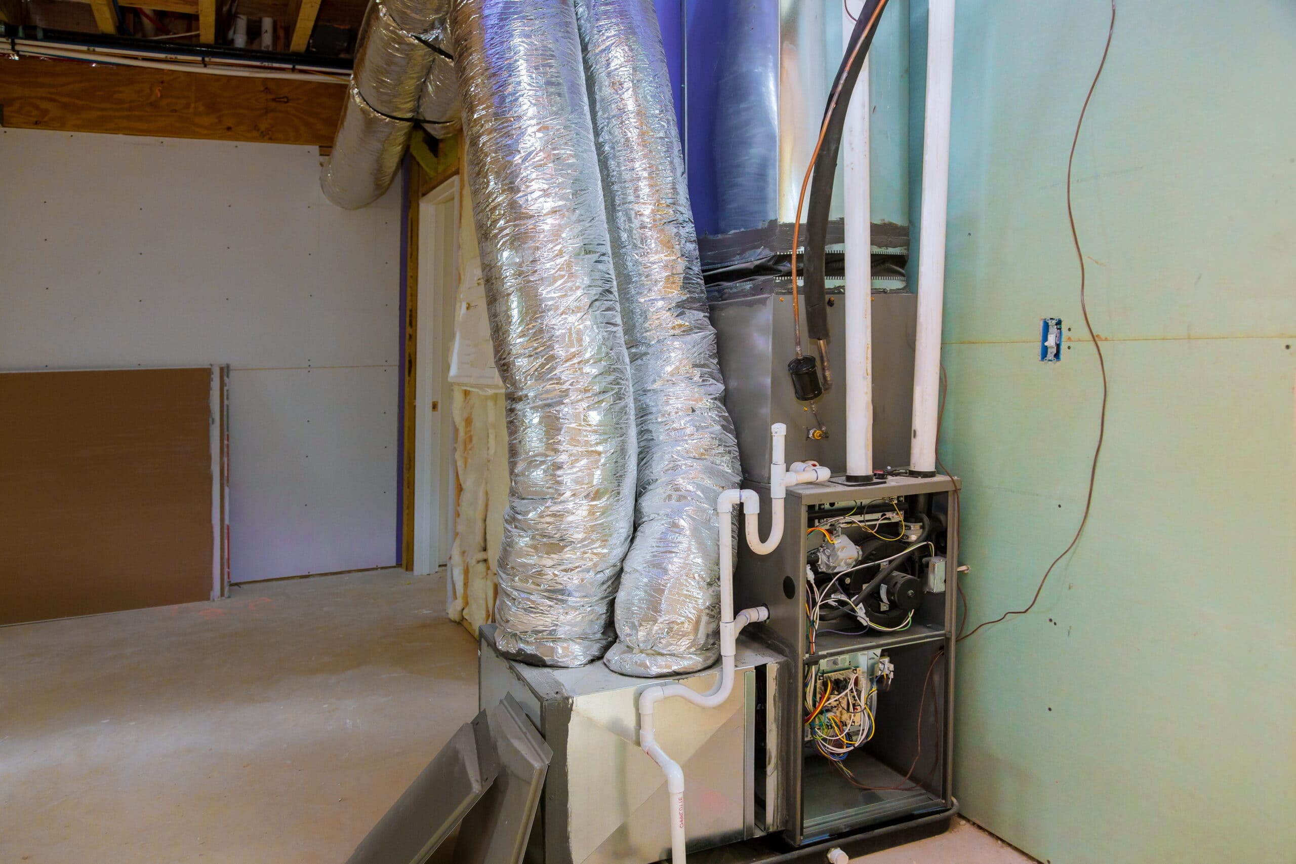 Wortham AC - Basement Interior with HVAC and Ductwork Installation