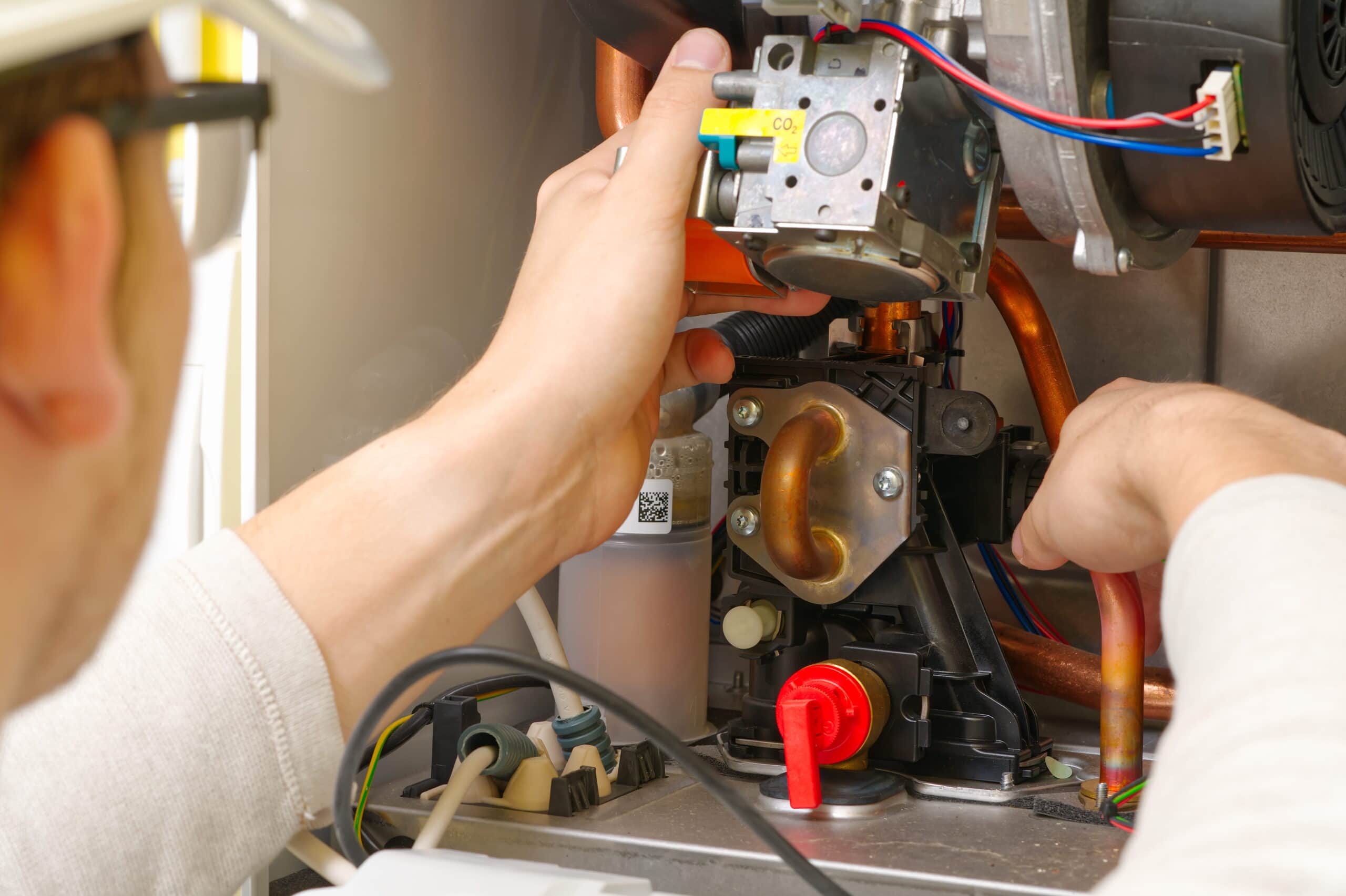 Wortham AC - Technician Repairing Boiler System